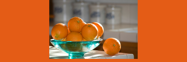 glass Bowl full of oranges