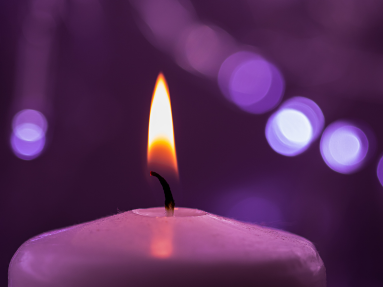 Purple votive candle