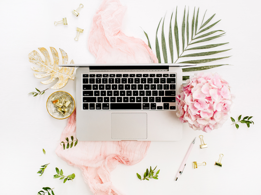 Laptop computer with flowers and leaves
