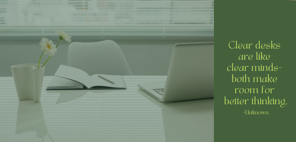 A clean, uncluttered desk with a laptop, open notebook, coffee cup, and flowers. Quote reads: “Clear desks are like clear minds—both make room for better thinking.”