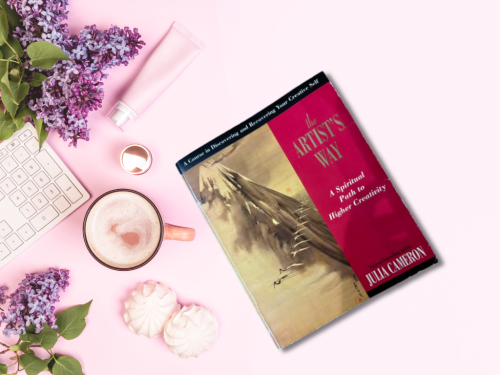 Desktop with Julia Cameron's The Artists Way Book